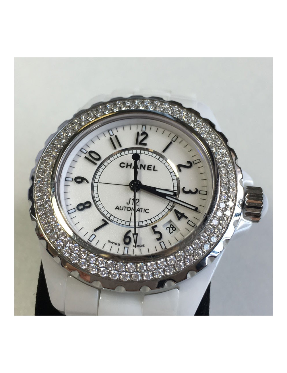 White ceramic CHANEL J12 watch and diamonds