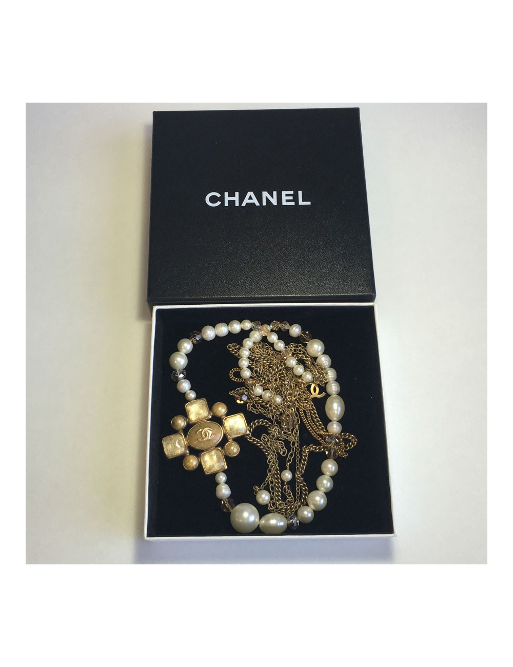 Necklace CHANEL multiple rows of beads, chains, and golden metal part