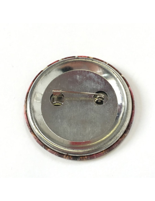 Pin’s CHANEL rond en métal 