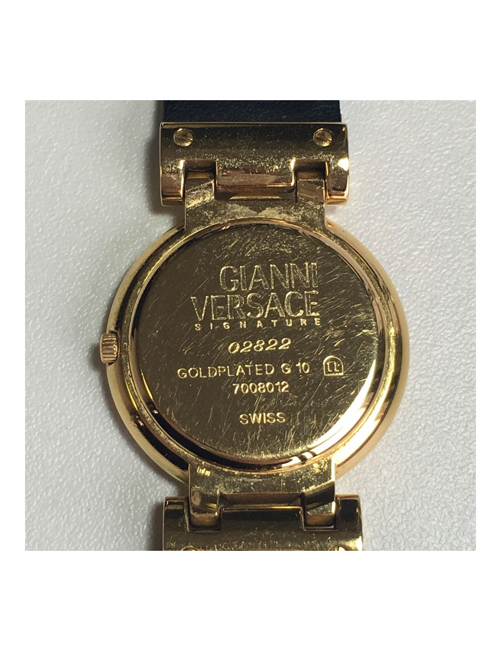 VERSACE "Signature Médusa" watch in gold plate and black leather