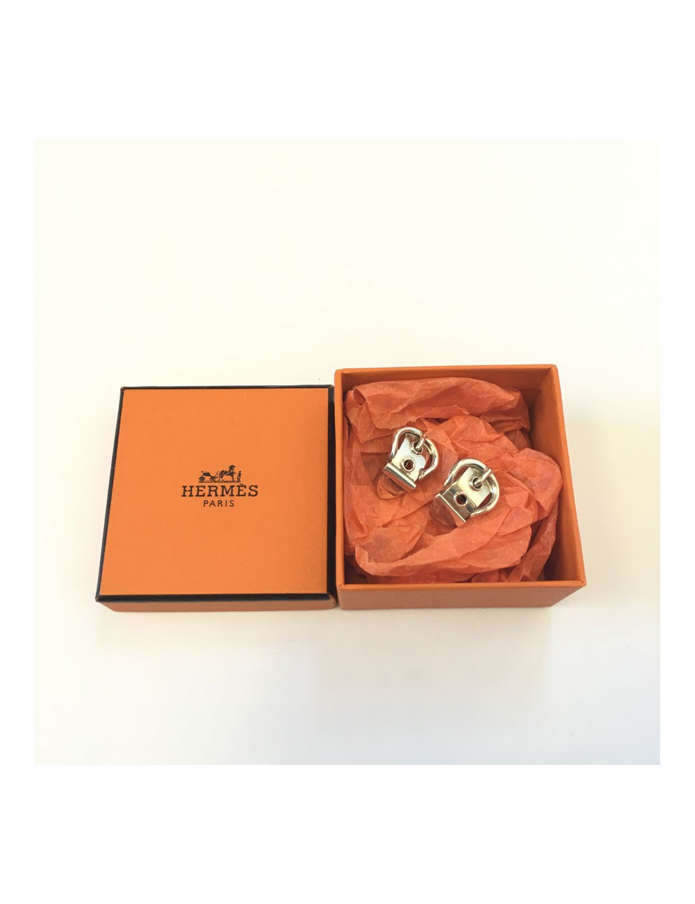Boucles d'oreille clous HERMES en argent massif