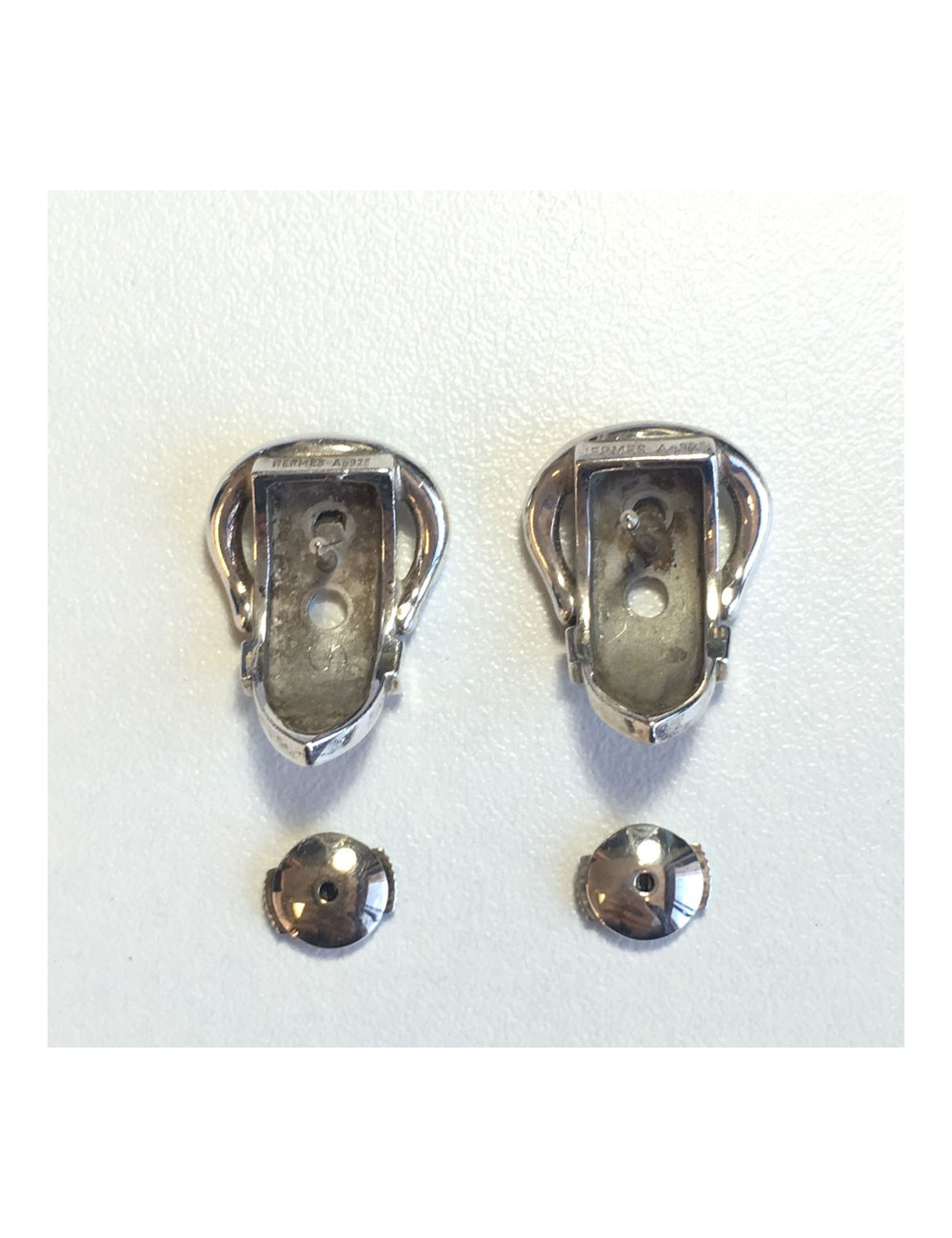 Boucles d'oreille clous HERMES en argent massif