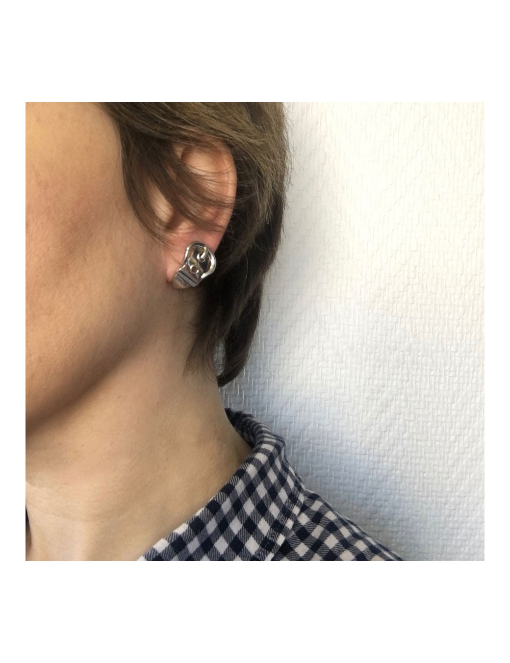 Boucles d'oreille clous HERMES en argent massif