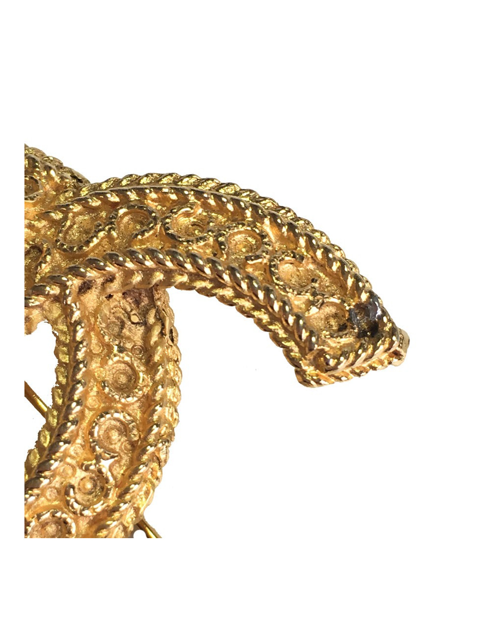 Broche CHANEL CC en métal doré