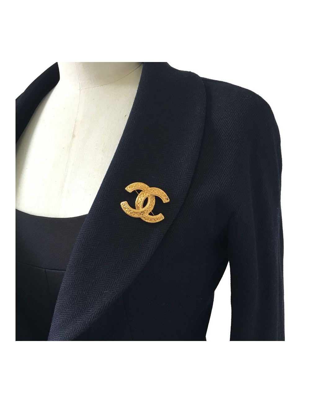 Broche CHANEL CC en métal doré