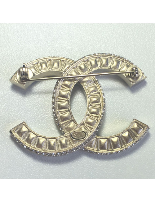 Broche CHANEL CC en cristal taille émeraude et métal doré