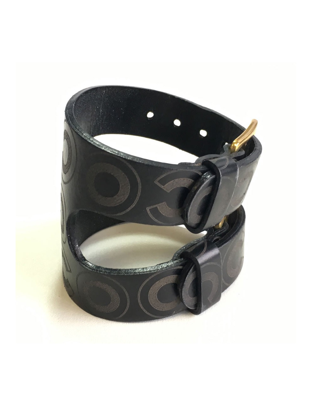 CHANEL "Coco" cuff bracelet in black leather