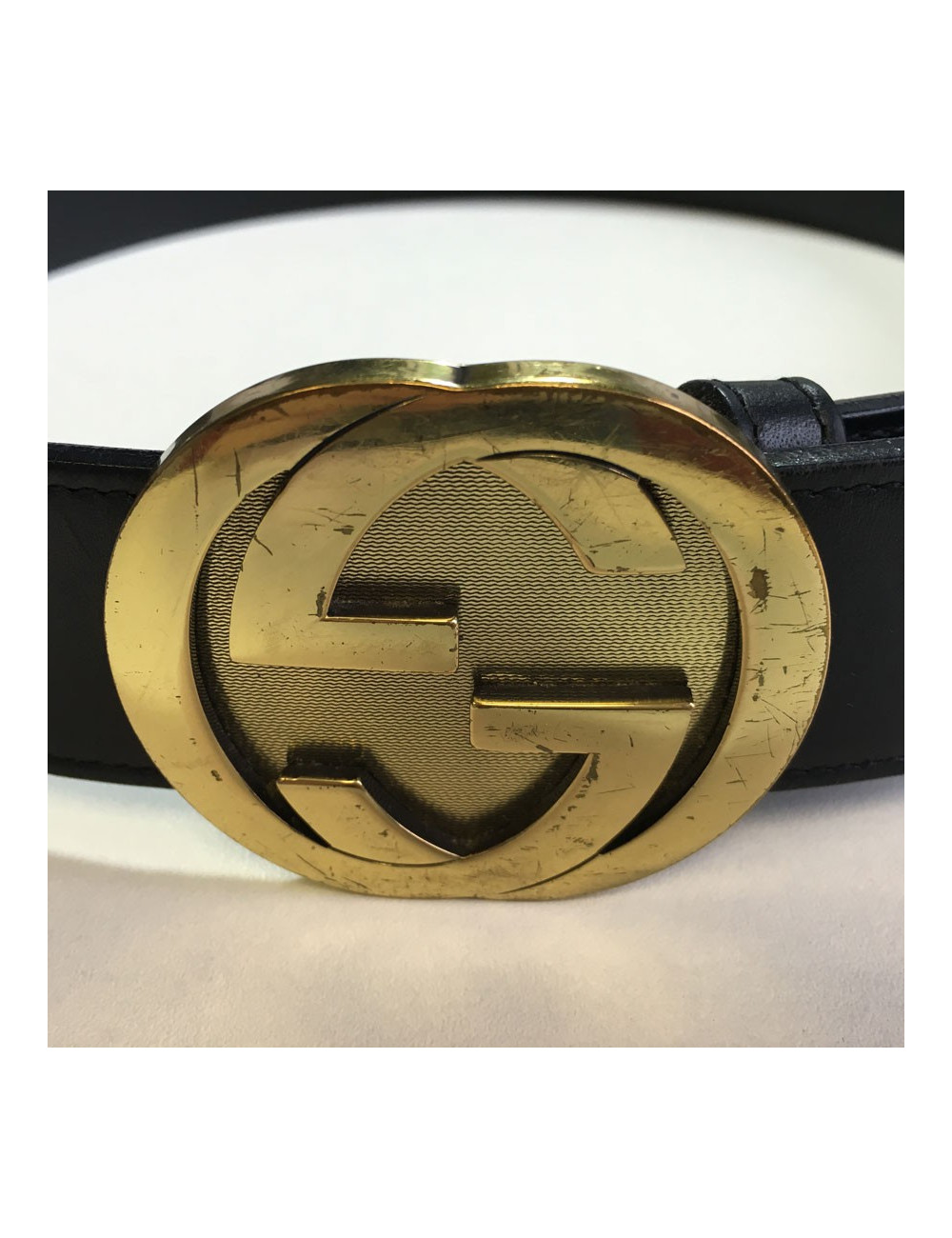 Ceinture GUCCI en cuir noir et boucle dorée 