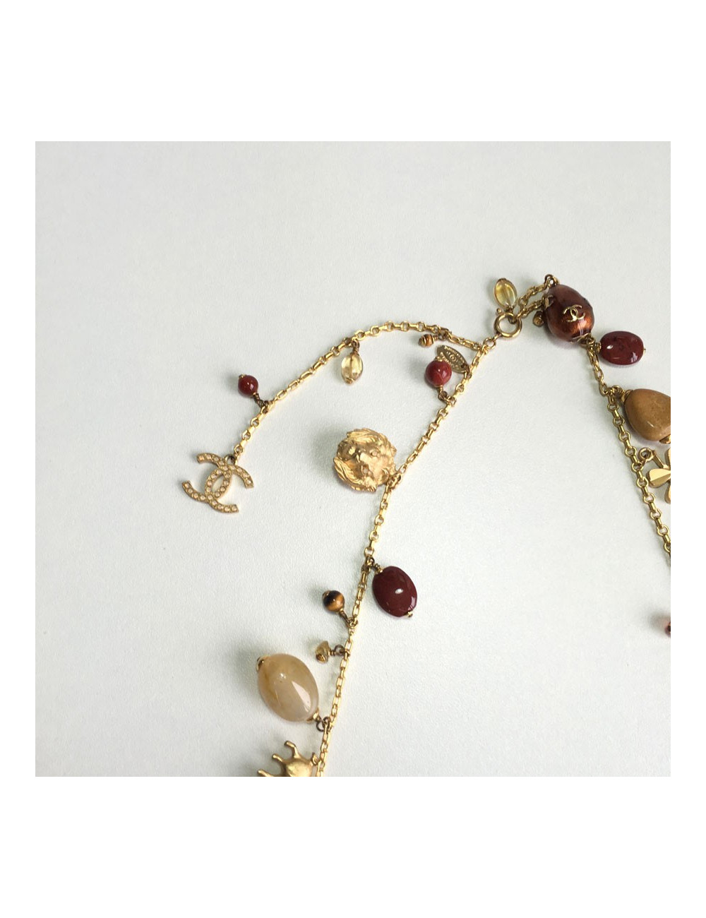 CHANEL couture chain necklace in gilded metal with charms 