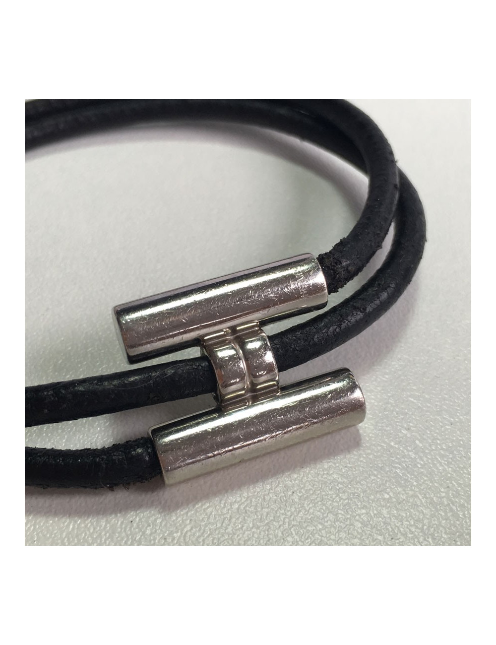 Bracelet Tournis HERMES lien en cuir noir et argent palladié