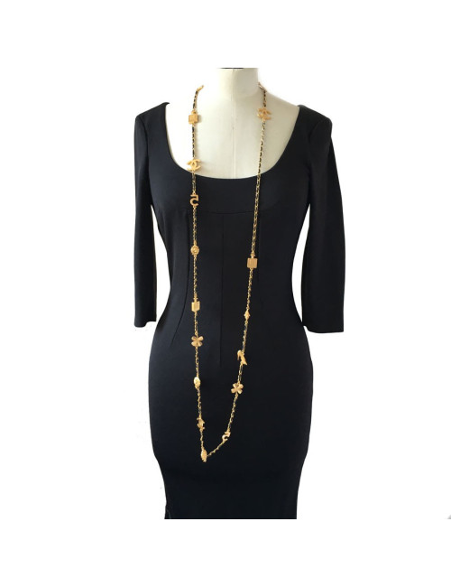 Sautoir CHANEL symboles en métal doré et lien en cuir noir