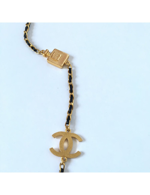 Sautoir CHANEL symboles en métal doré et lien en cuir noir