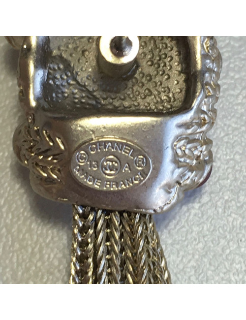 Boucles d'oreille clous CHANEL pendantes en métal doré