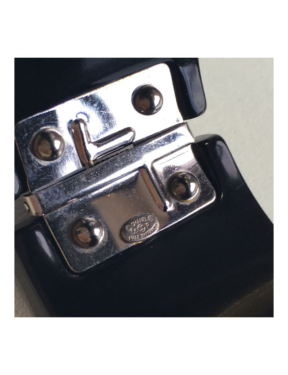 CHANEL cuff in black plastic and inclusion of white rhinestones