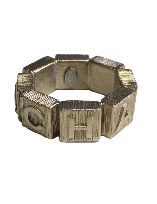 Bague CHANEL en métal doré et perle nacrée T53