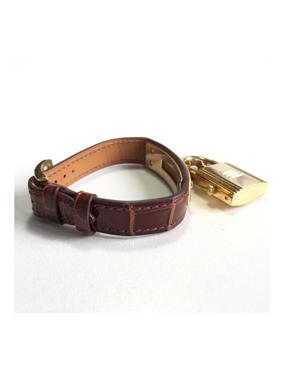 Montre Kelly HERMES bracelet en alligator marron et bijouterie plaqué or