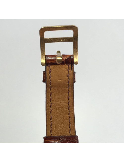 Montre Kelly HERMES bracelet en alligator marron et bijouterie plaqué or