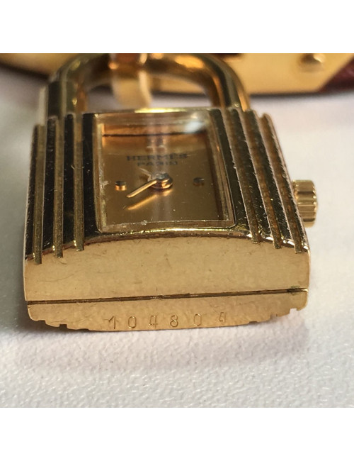 Montre Kelly HERMES bracelet en alligator marron et bijouterie plaqué or