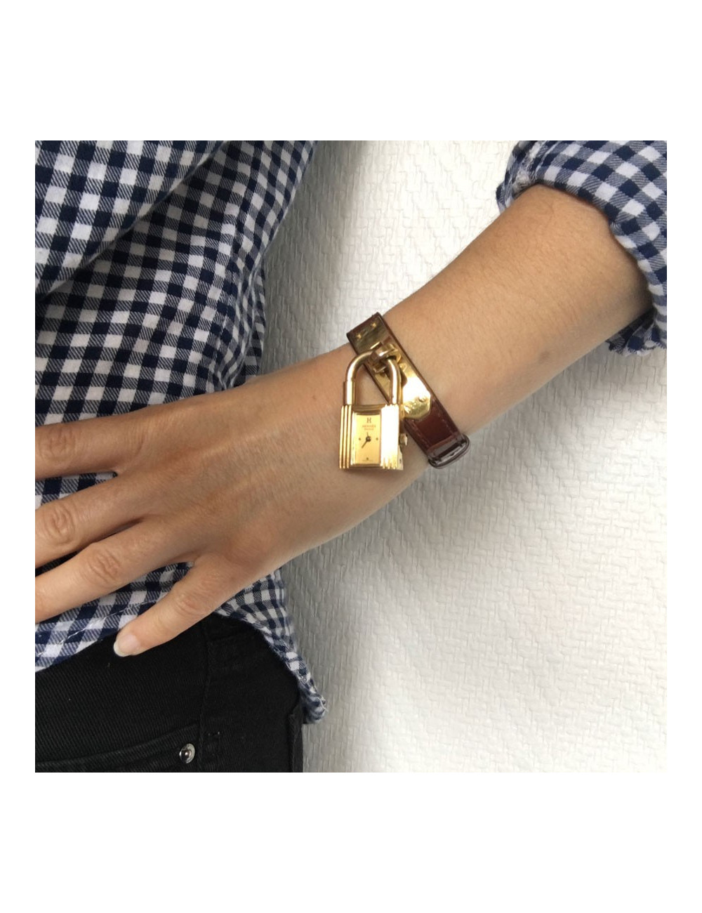 Montre Kelly HERMES bracelet en alligator marron et bijouterie plaqué or