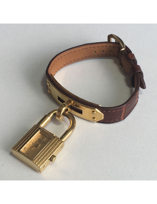 HERMES Kelly watch alligator and gold hardware