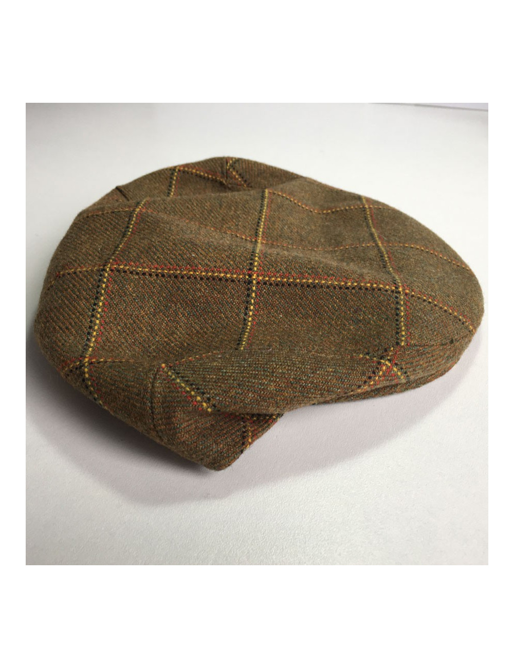 MOTSCH cap for HERMES "Edinburgh" collection in wool with khaki check pattern