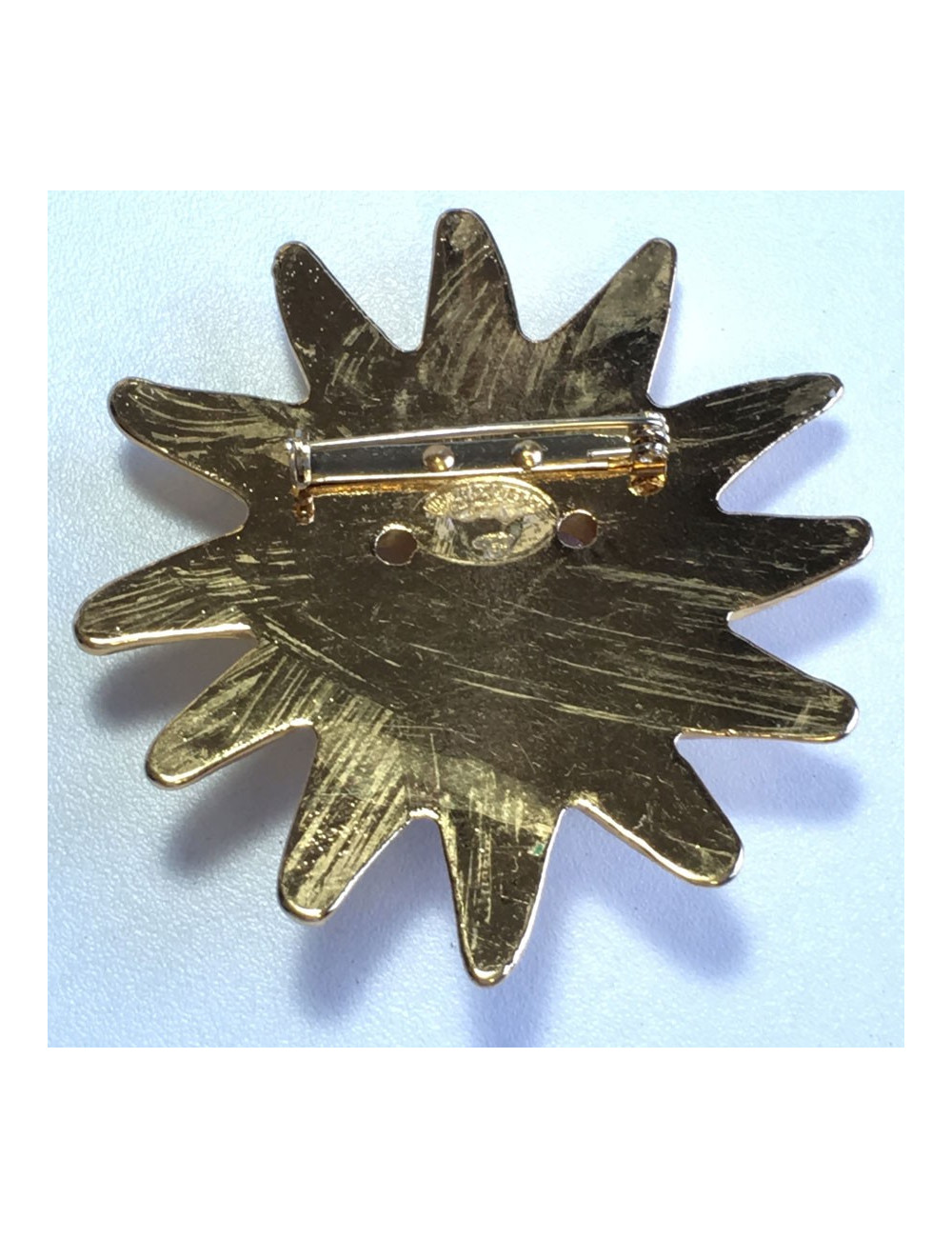 Broche CHRISTIAN LACROIX soleil en métal doré