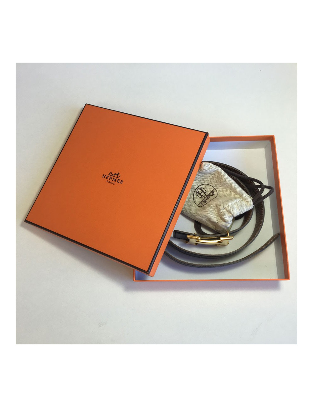 Ceinture HERMES T 85 réversible en cuir box noir et cuir togo gold