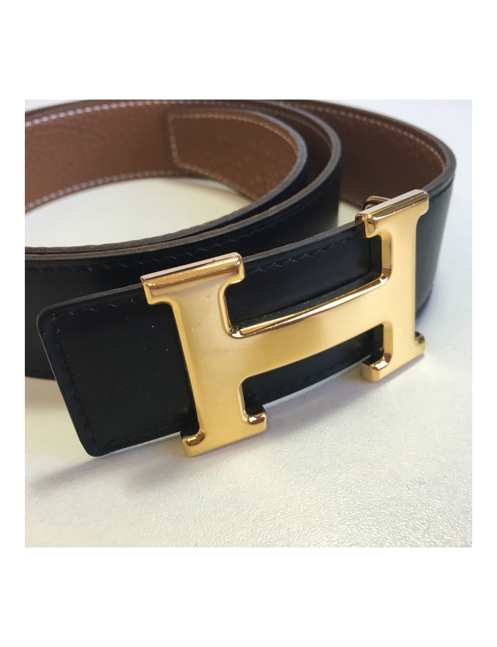 Ceinture HERMES T 85 réversible en cuir box noir et cuir togo gold