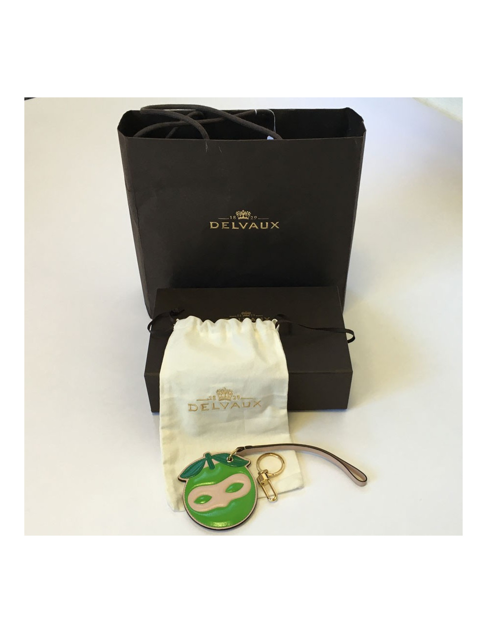 xxx Porte-clefs DELVAUX masqué en veau vert et rose