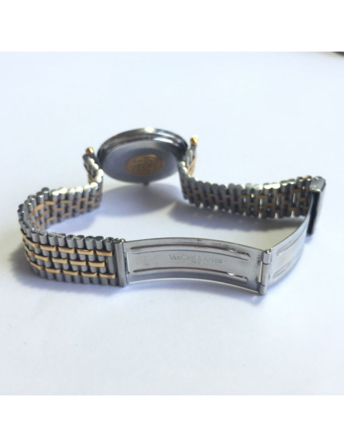 Shows VAN CLEEF & ARPELS man in steel and gold