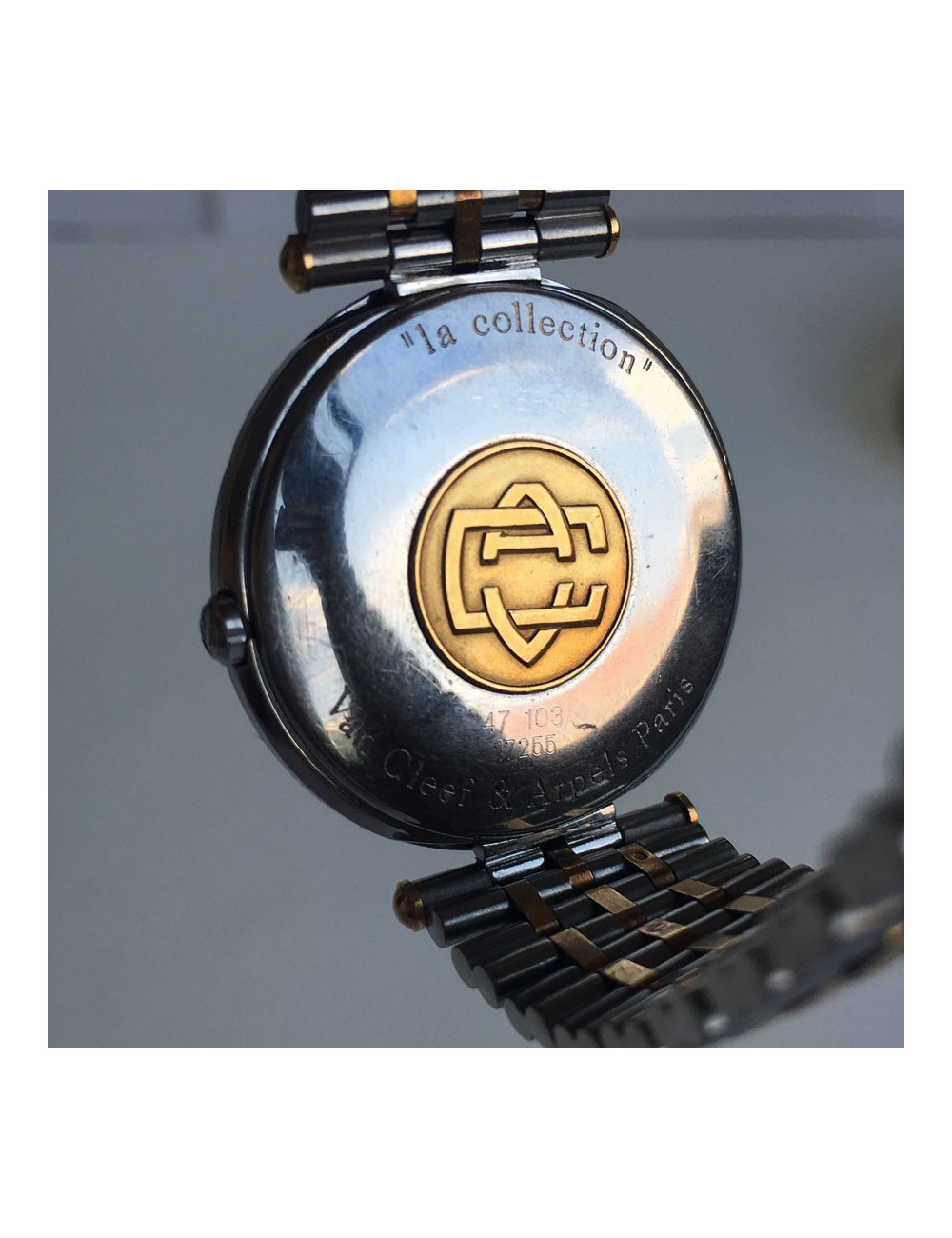 Shows VAN CLEEF & ARPELS man in steel and gold