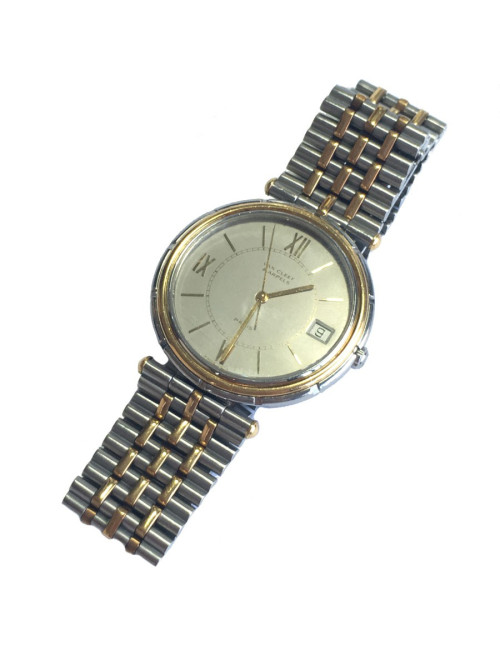 Shows VAN CLEEF & ARPELS man in steel and gold