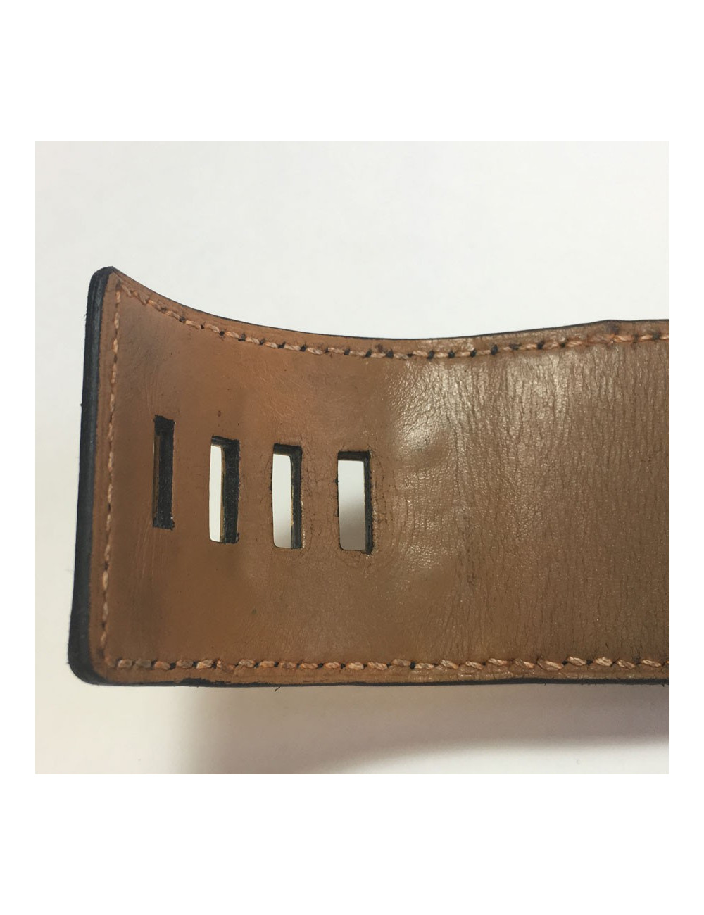 Manchette HERMES Médor en cuir noir 