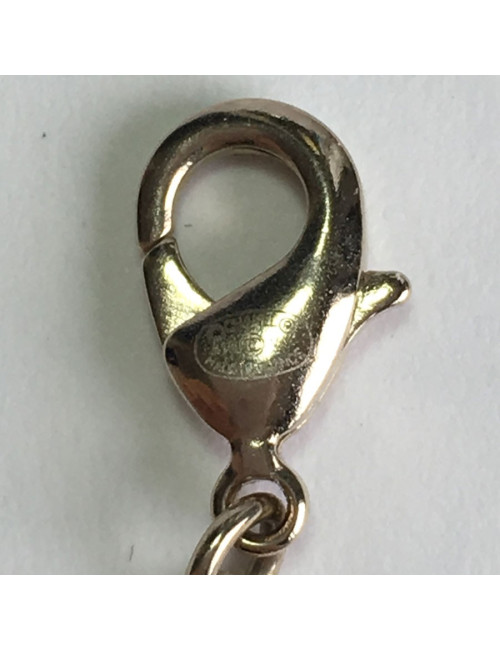 Collier CHANEL pendentif CC en strass et métal doré 