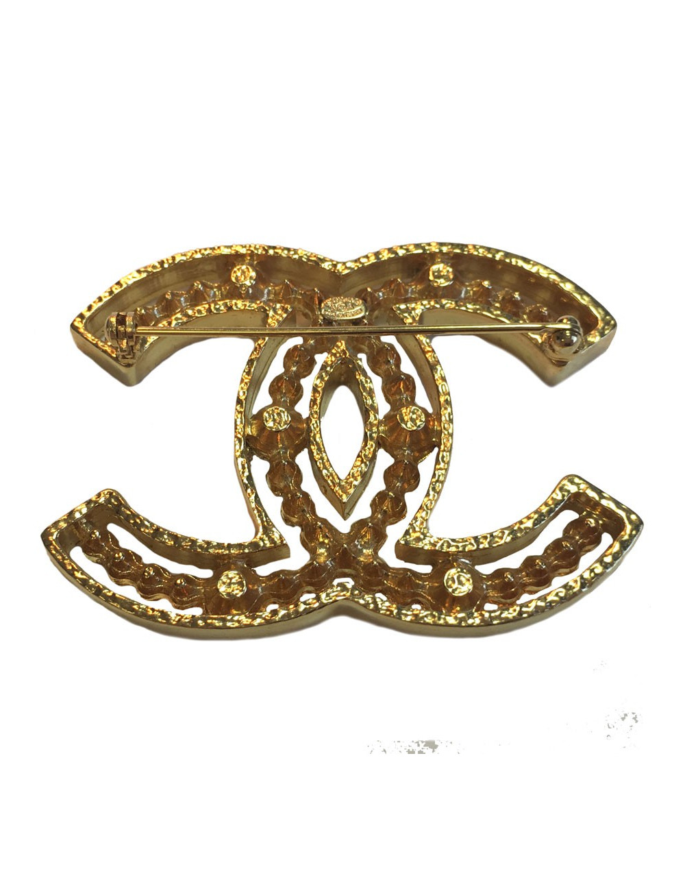 Broche CHANEL en métal doré et strass