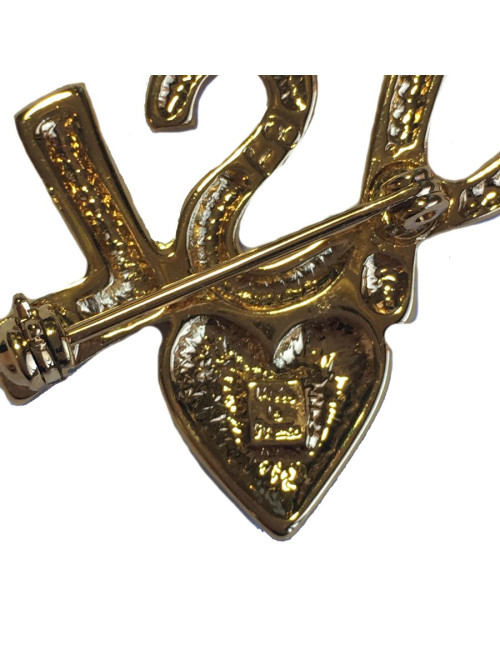 Broche YVES SAINT LAURENT YSL en métal doré