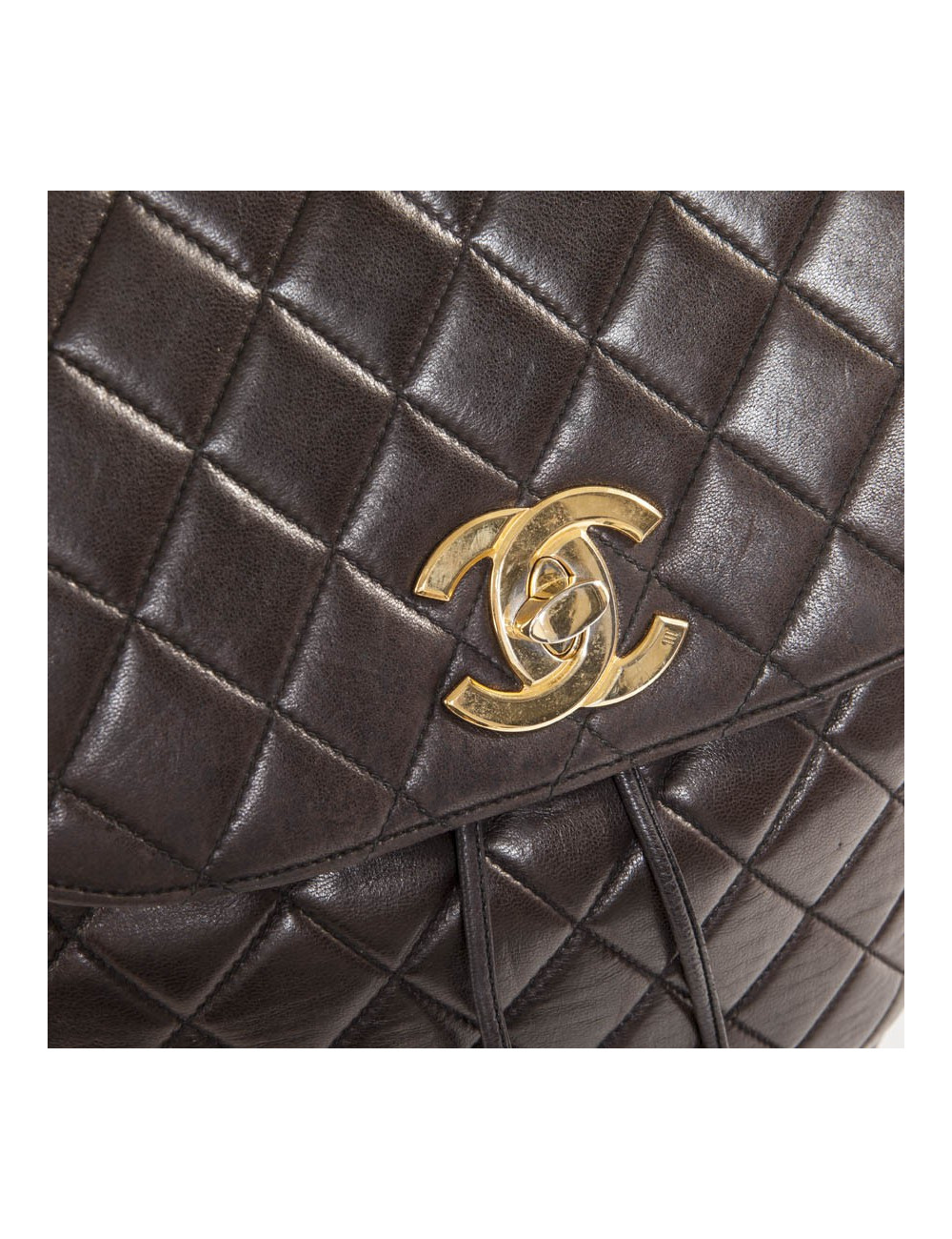 Sac à dos vintage CHANEL cuir matelassé marron