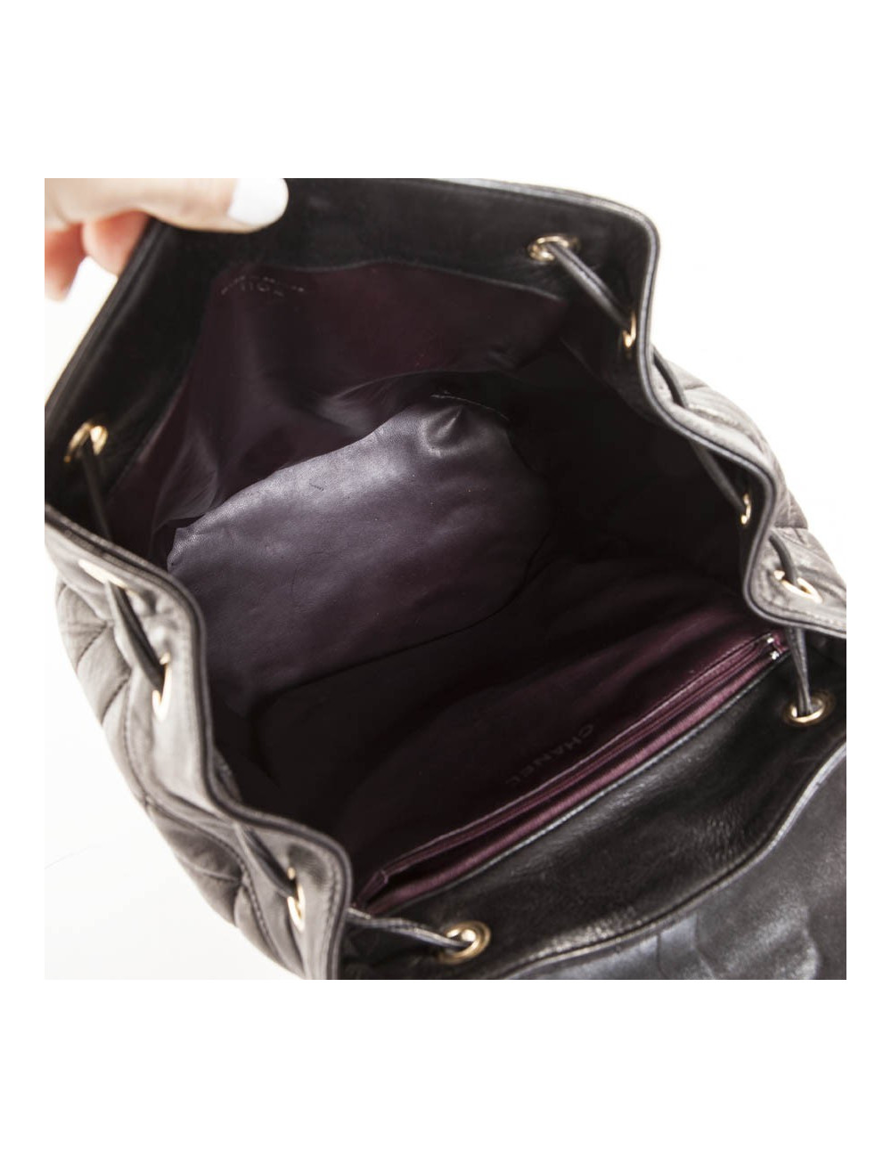 Sac à dos vintage CHANEL cuir matelassé marron