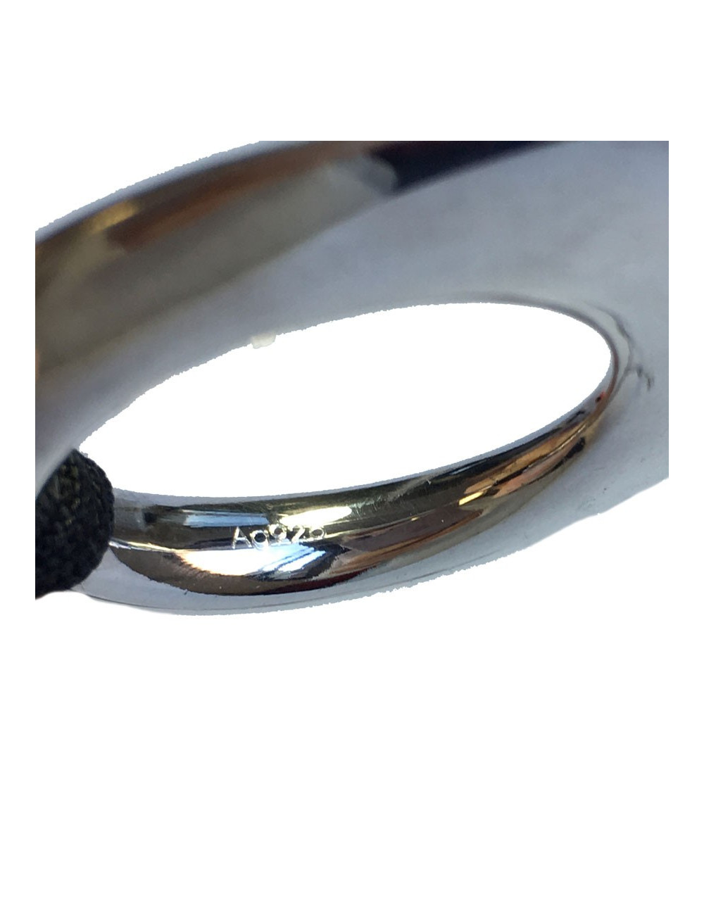 Collier HERMES pendentif en argent et lien en tissu noir