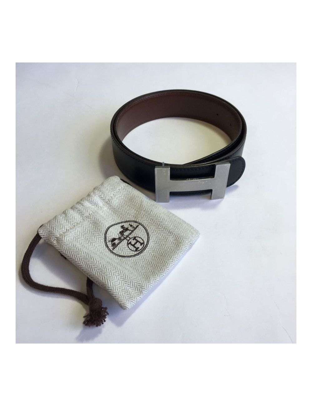 Ceinture H HERMES réversible en cuir noir et marron