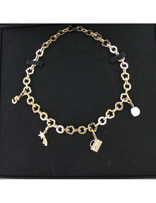 Collier CHANEL en or jaune et charms 