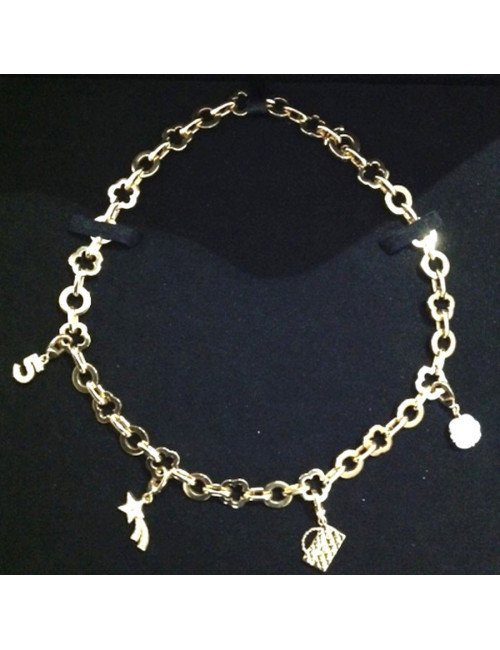 Collier CHANEL en or jaune et charms 