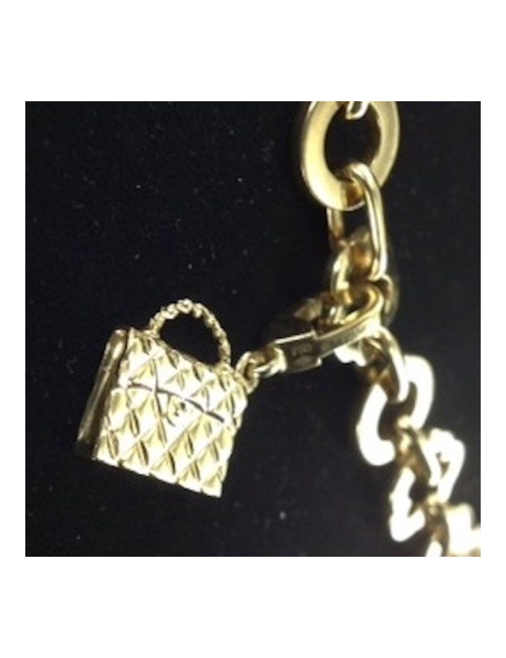 CHANEL yellow gold necklace and charms