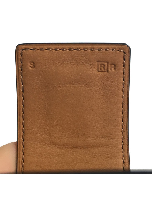 Manchette MEDOR HERMES en cuir box veau noir et bijouterie laiton plaqué or