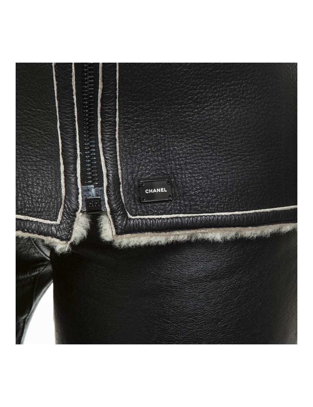 Veste CHANEL T 42 peau retournée noir interieur blanc