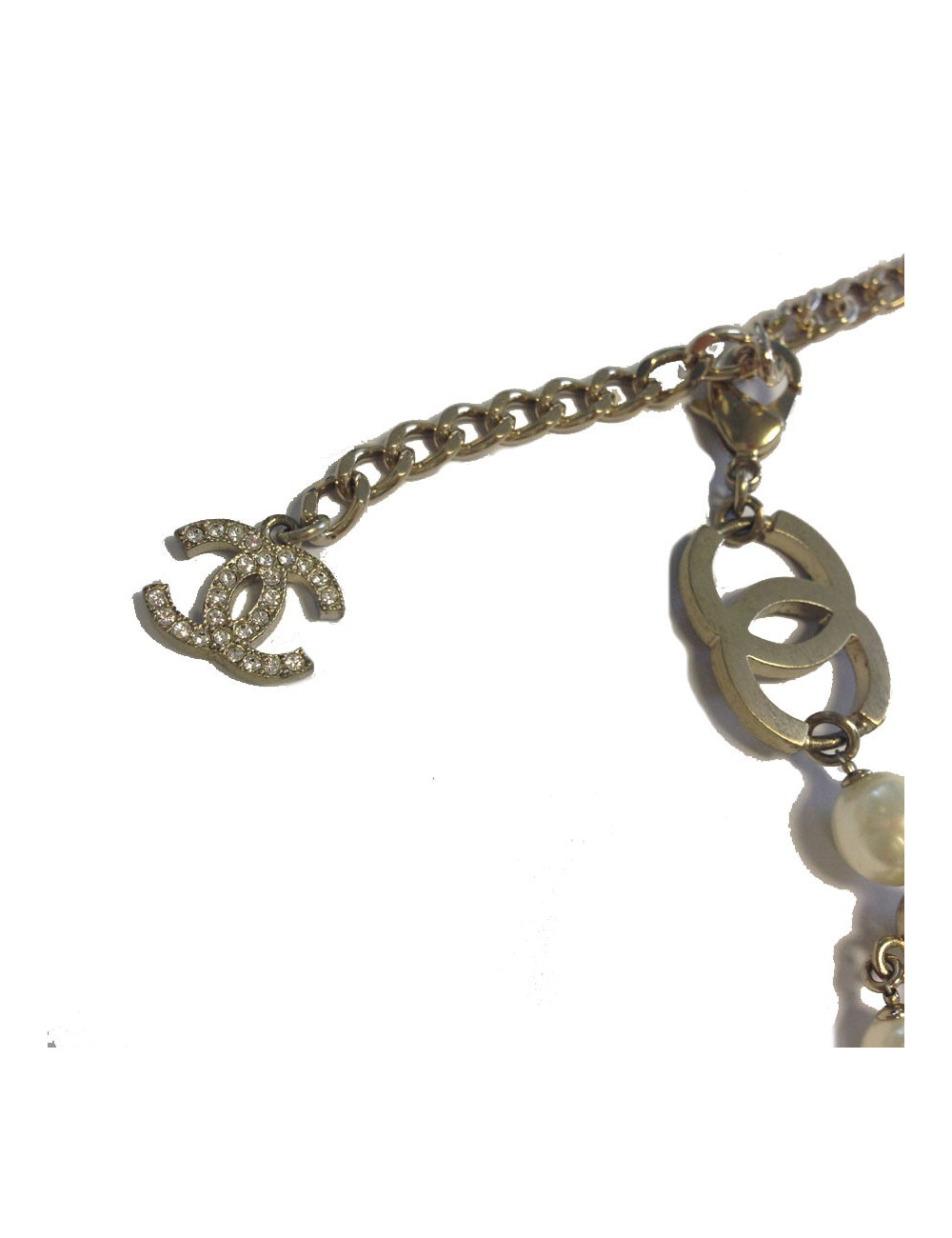 CHANEL pearls belt with a gilded metal bow set with rhinestones