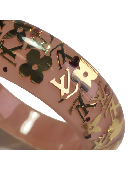 Bracelet LOUIS VUITTON rose transparent à inclusions "LV" 