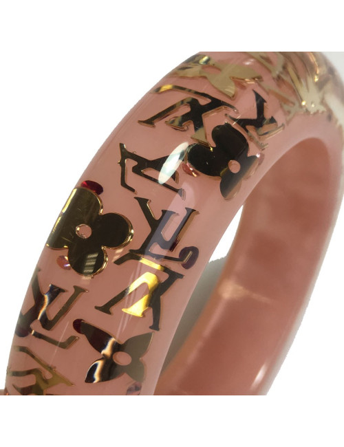 Bracelet LOUIS VUITTON rose transparent à inclusions "LV" 