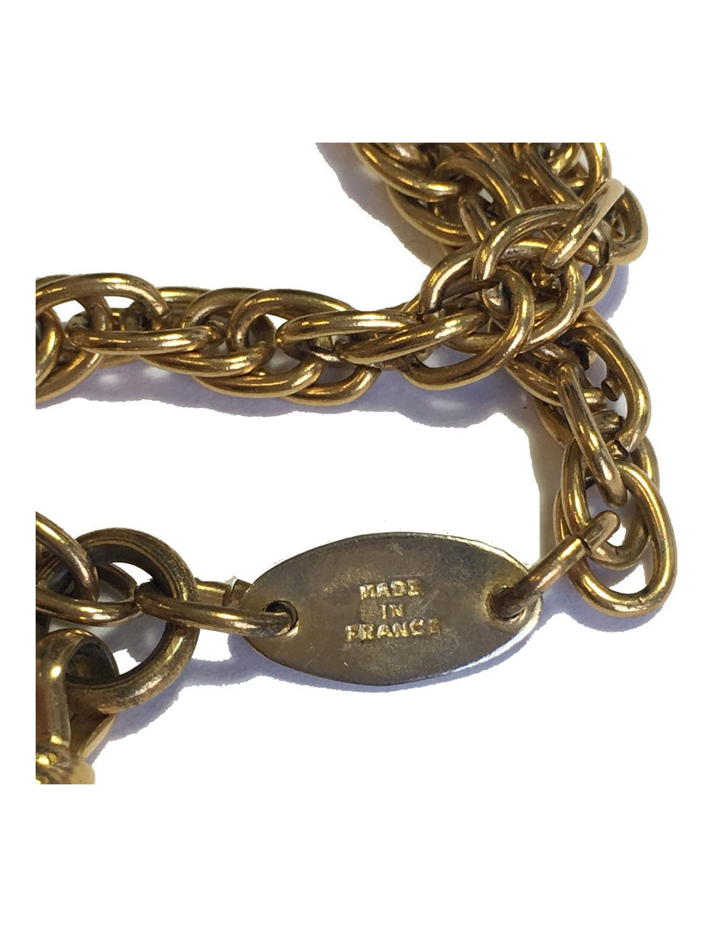 Sautoir CHANEL Vintage avec loupe en métal doré