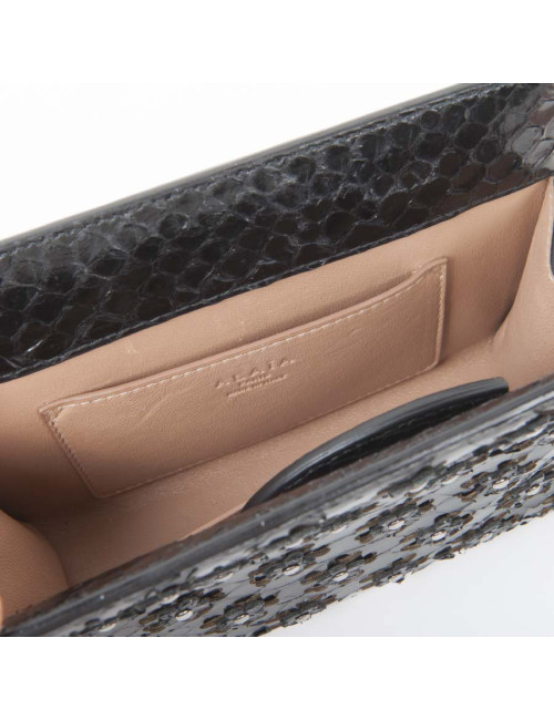 Cover in black python ALAIA with its mirror